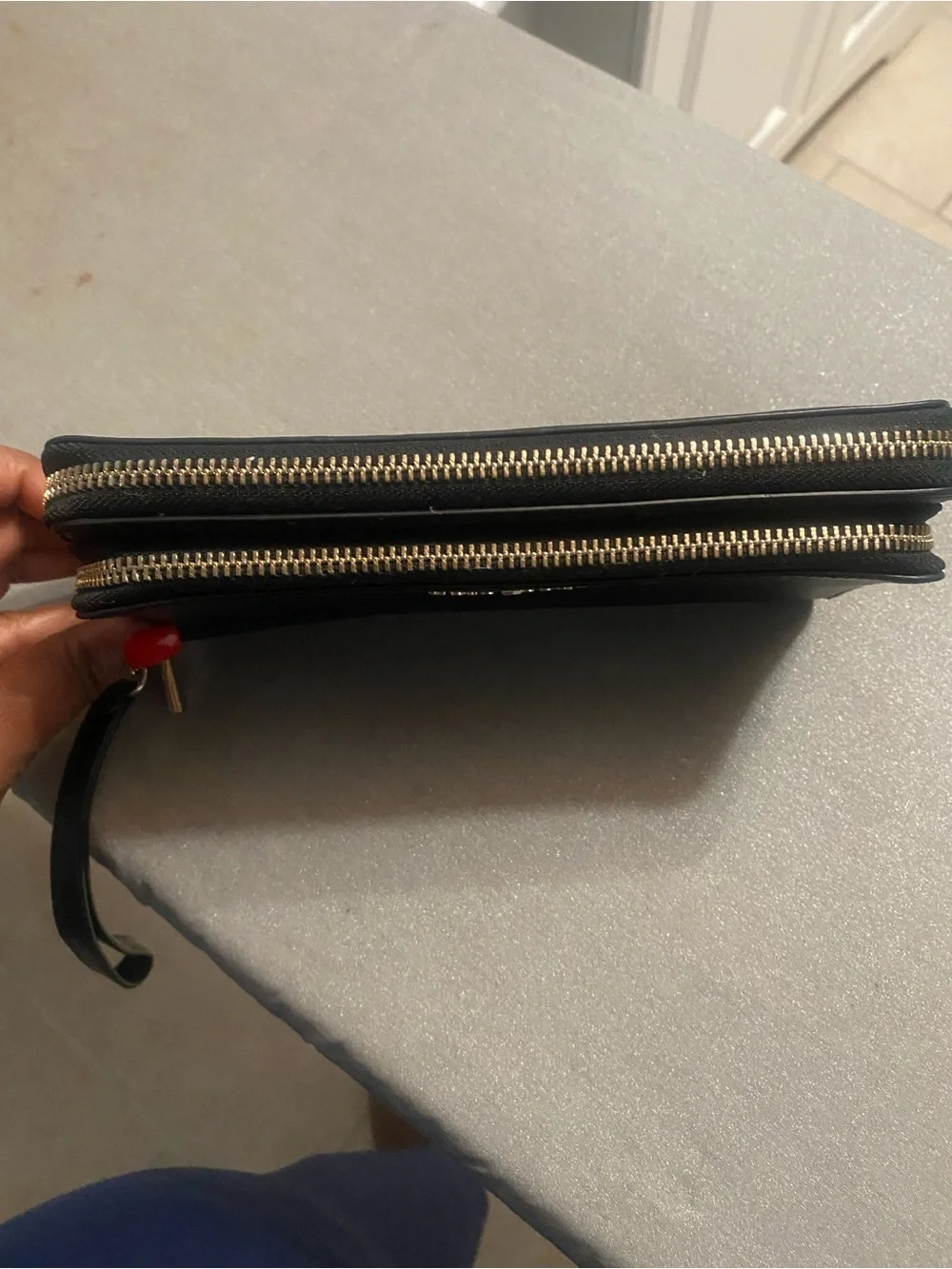 kate spade Black Zip-Around Saffiano Leather Wallet